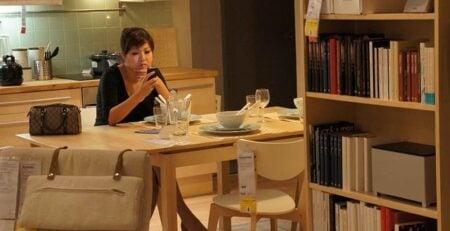woman checking email on phone