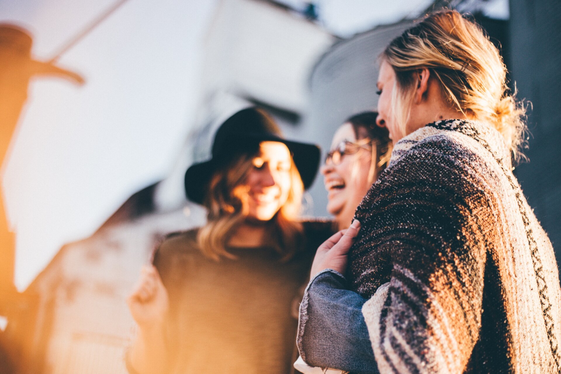 Photo of women celebrating, laughing.